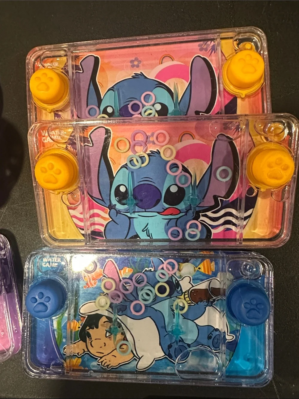 Disney Handheld Water Ring Toss Games - Purple, Blue, Yellow